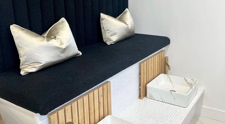 Luxurious seating area at Bella Beauty By Sarah in Merthyr Tydfil, Wales, showcasing chic decor and relaxation space.