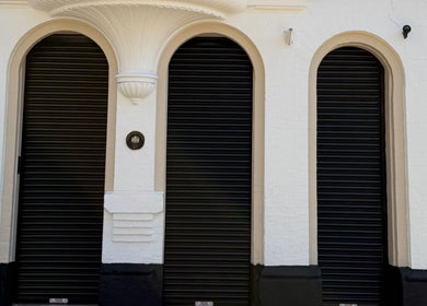 Exterior of Rejuvenate@45 in Stockport, England, GB with three elegant arched entrances.