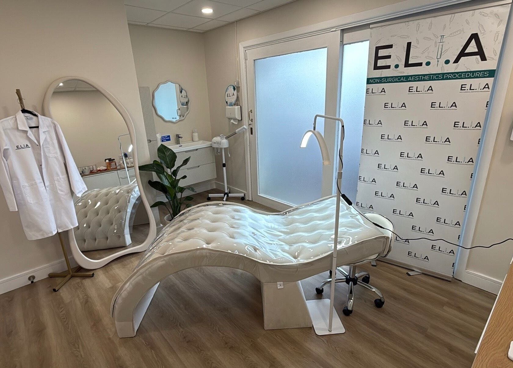 Elegant treatment room at Rejuvenate@45, Stockport, England, GB, featuring stylish decor and modern equipment.