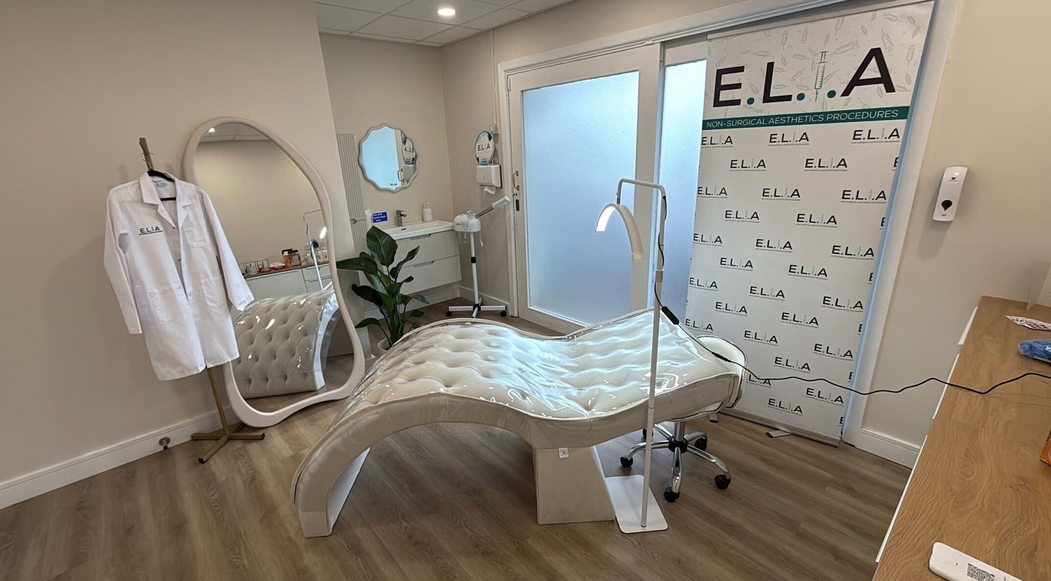 Elegant treatment room at Rejuvenate@45, Stockport, England, GB, featuring stylish decor and modern equipment.