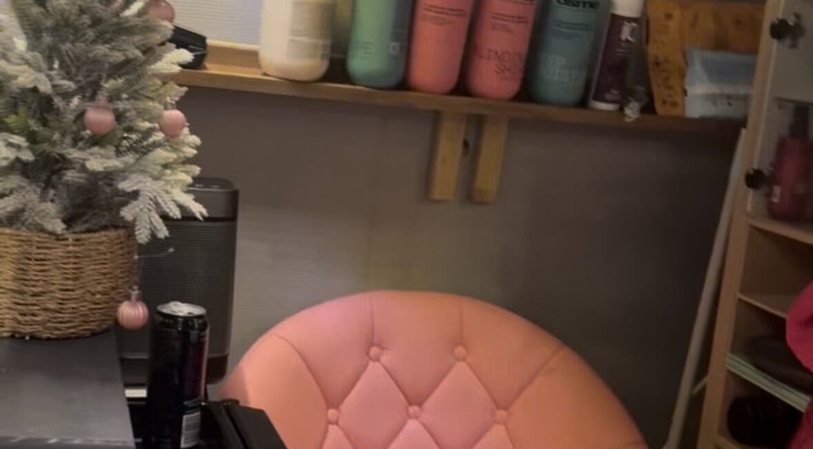 Cozy seating area with pink chair and products at Created by Courtney, Birmingham, England, GB.