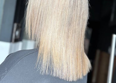 Shiny blonde bob haircut at Sei Bella Hair, Oranmore, County Galway, IE, showcasing expert styling.