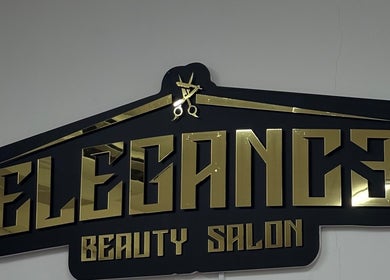 Cartel dorado de Elegance Beauty Salon en Jonvthanbarber, Municipio Carrizal, Miranda, VE.