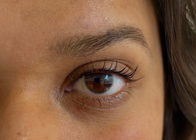 Close-up of expertly styled lashes at Lash Priestess, London, England, GB. Highlighting natural beauty.