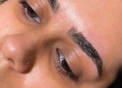 Close-up of expertly shaped eyebrows at Devinebrows, Manchester, England, GB.