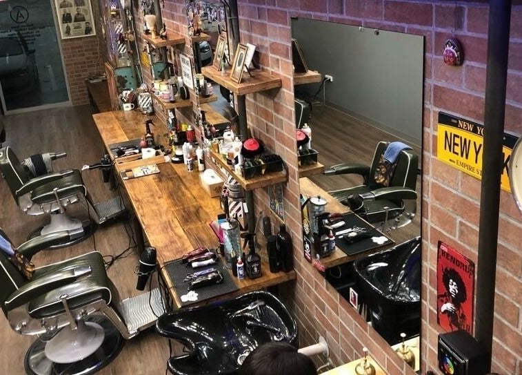 Suzathebarber's rustic interior with vintage chairs in Millner, Northern Territory, AU showcases a classic vibe.