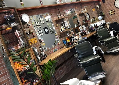 Vintage barber chairs and retro decor at Suzathebarber, Millner, Northern Territory, AU.