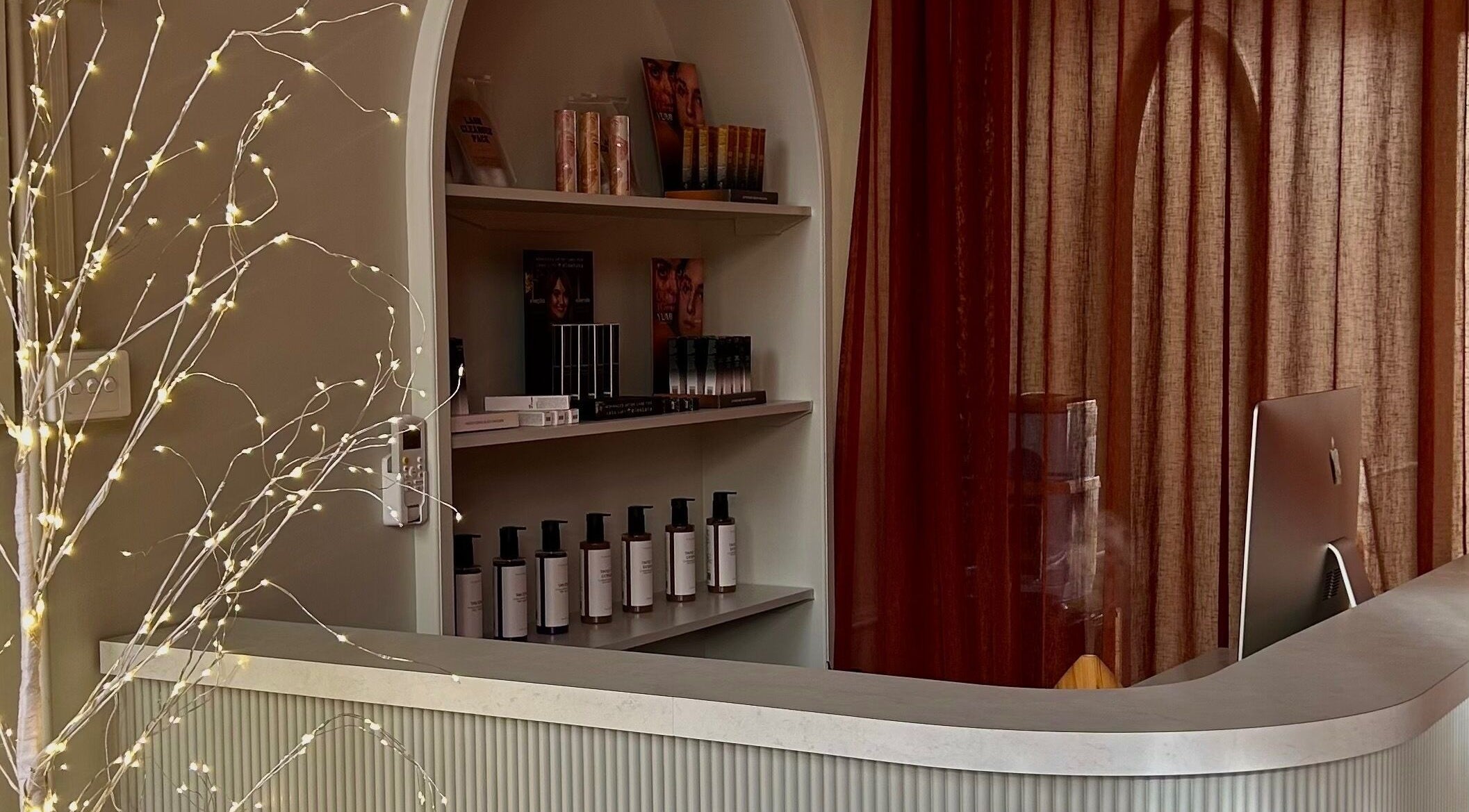 Reception area with product display at Through Her Eyes, Richmond, Victoria, AU.