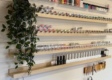 Colorful nail polish display at Bonita By Kate in Hyde, England, GB, highlighting variety and elegance.