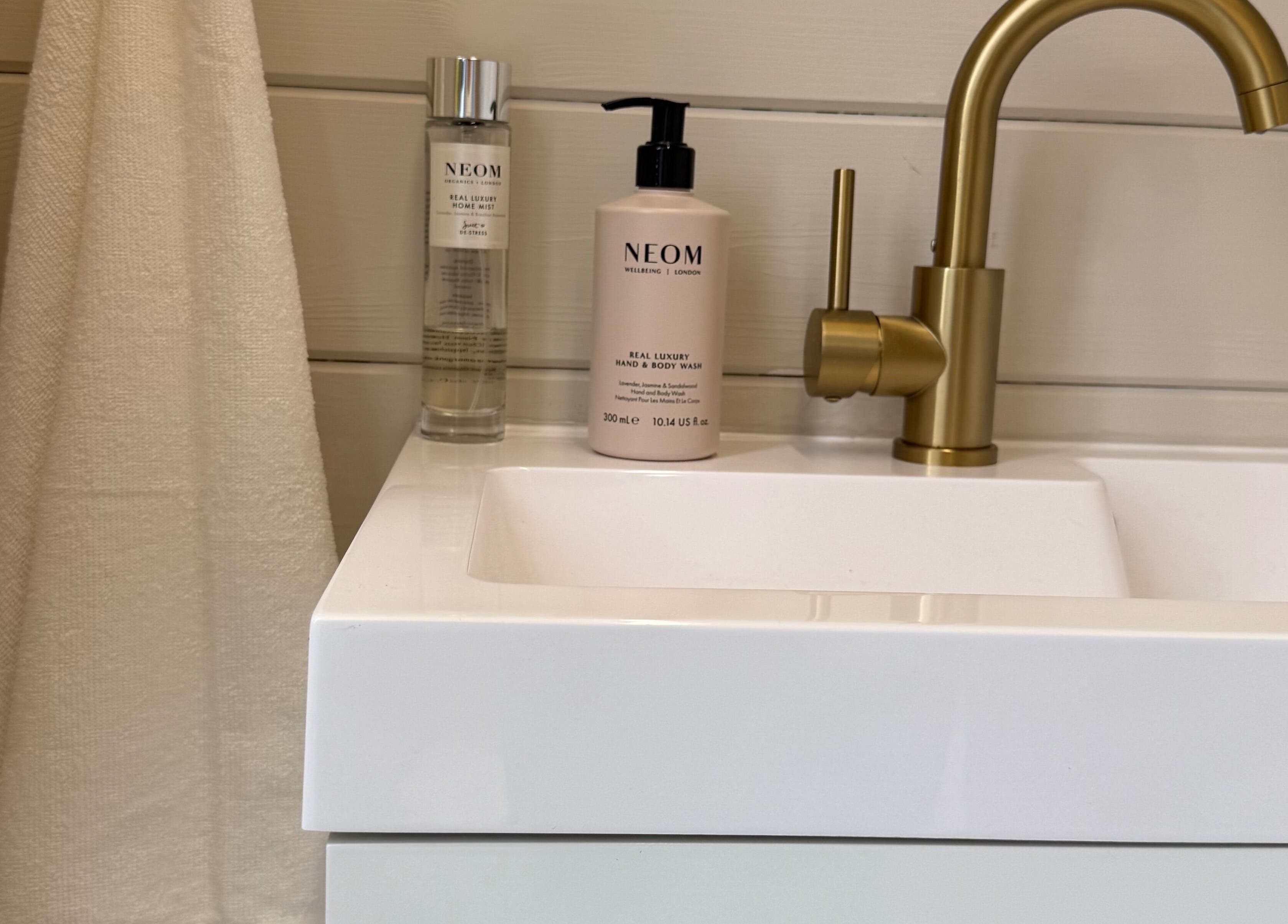 Elegant gold faucet with luxury hand wash at Bonita By Kate, Hyde, England, GB. Enhance your wellness experience.