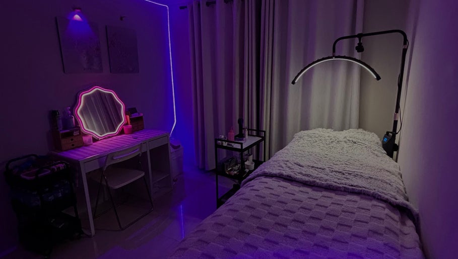 Tranquil beauty room at BeautyBlessed Co, Baldivis, Western Australia with ambient lighting and cozy bed.