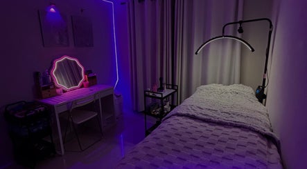 Tranquil beauty room at BeautyBlessed Co, Baldivis, Western Australia with ambient lighting and cozy bed.