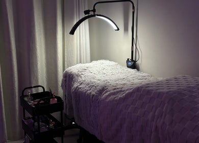 Cozy treatment room at BeautyBlessed Co, Baldivis, Western Australia, AU, featuring soft lighting and inviting decor.
