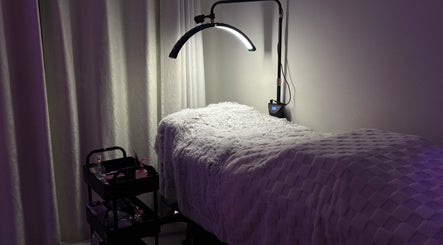 Cozy treatment room at BeautyBlessed Co, Baldivis, Western Australia, AU, featuring soft lighting and inviting decor.