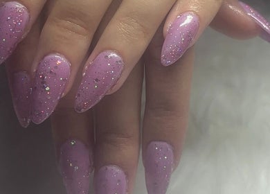 Purple glitter nails at Solembeauty, Labrador, Queensland, AU, showcasing stylish manicure.