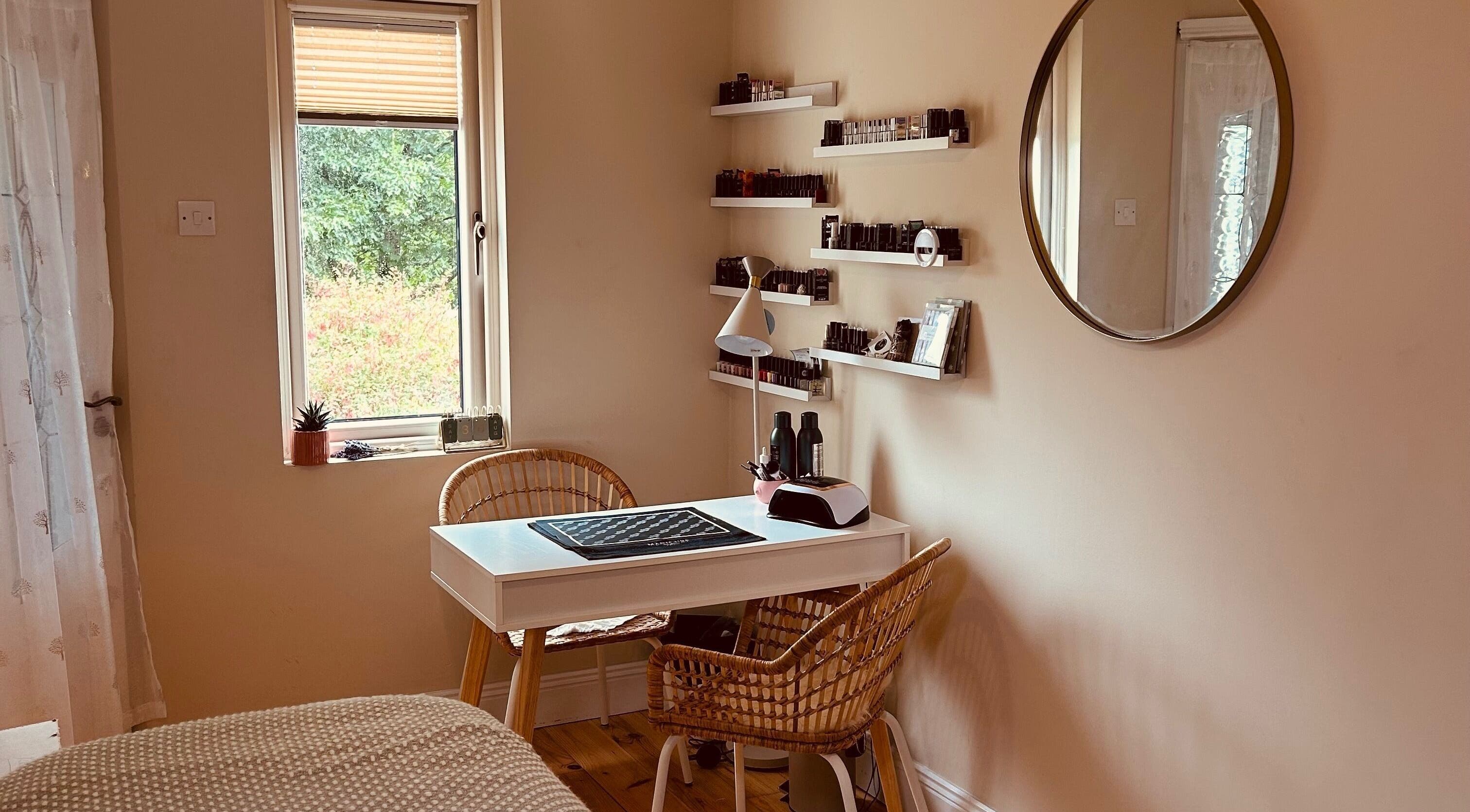 Stylish beauty room at Beauty Number 7, Kilmacthomas, County Waterford, IE, with nail station and decor.