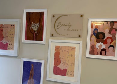 Artwork display at Beauty Number 7 in Kilmacthomas, County Waterford, IE, showcasing diverse body illustrations.