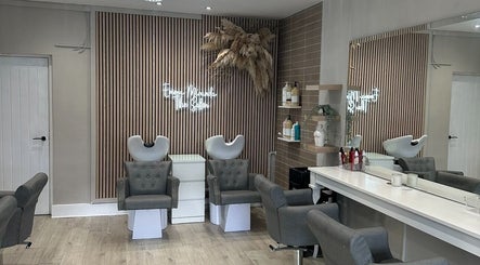 Elle Rochford hair in Whiston, England, GB, features elegant salon chairs and stylish decor.