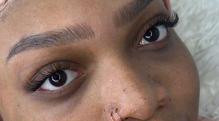 Close-up of woman with beautifully groomed eyebrows and lashes at Dk Co., Johannesburg, Gauteng, ZA.