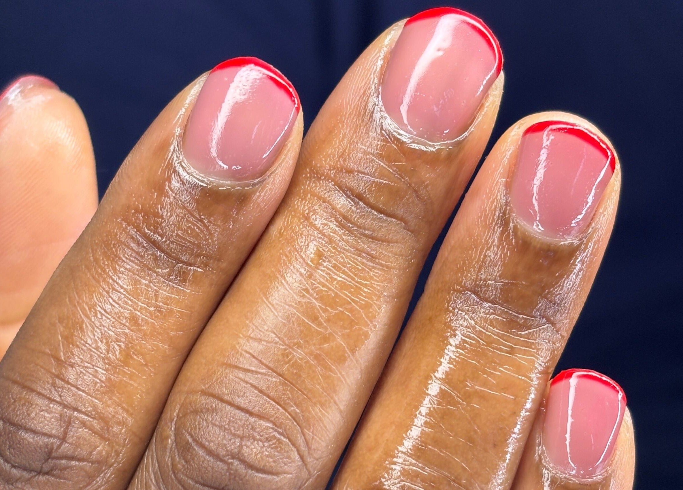 Elegant red-tipped manicure at Nail Diaries Studio, Sandton, Gauteng, ZA. Perfectly polished nails.