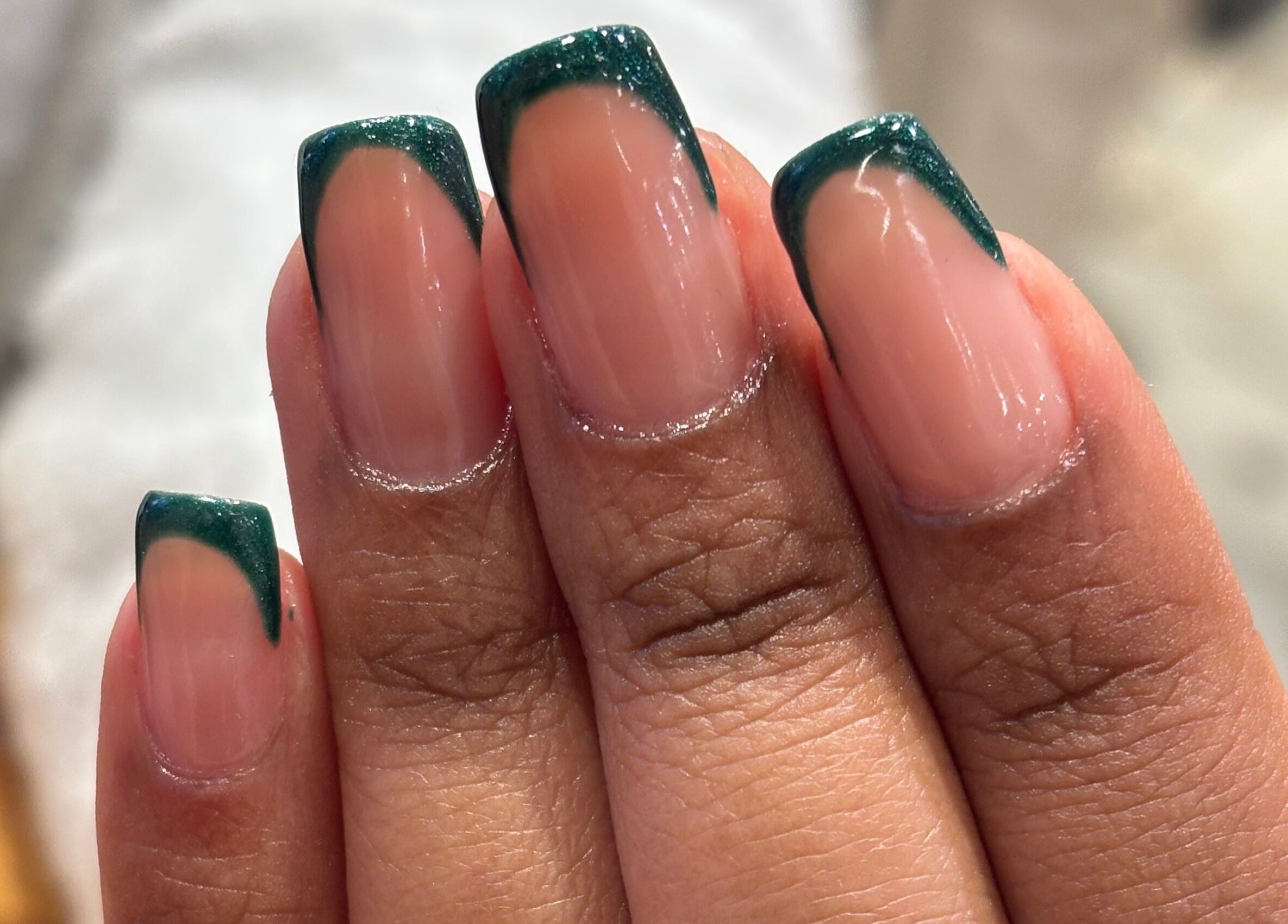 Stunning emerald-tipped nails at Nail Diaries Studio, Sandton, Gauteng, ZA.