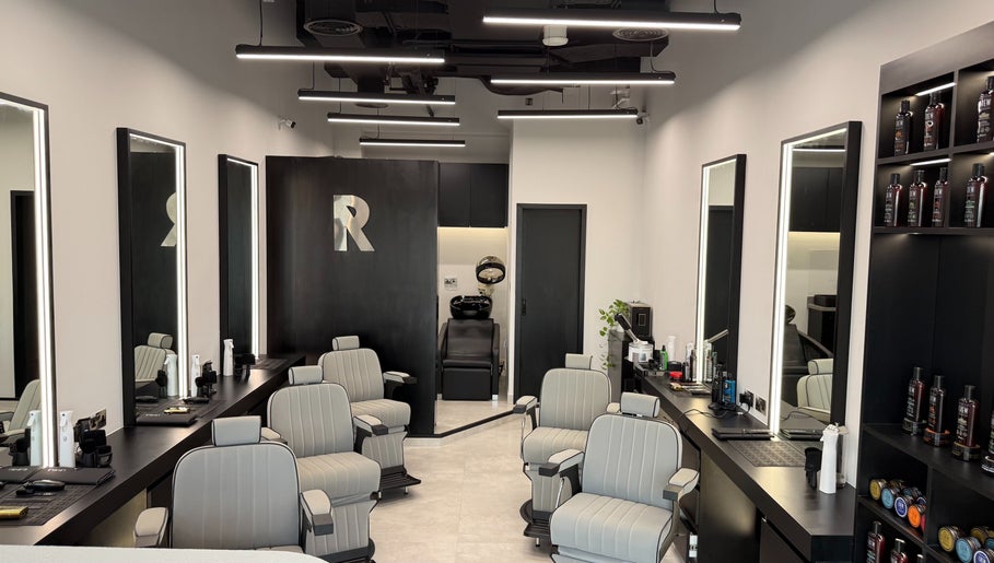 Sleek interior of Razorlane Gents Salon L.L.C, Dubai, Dubai, AE, showcasing stylish barber chairs and products.