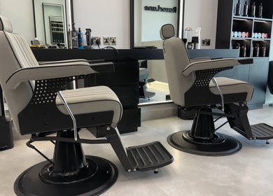 Barber chairs at Razorlane Gents Salon L.L.C in Dubai, Dubai, AE, showcasing modern salon design.