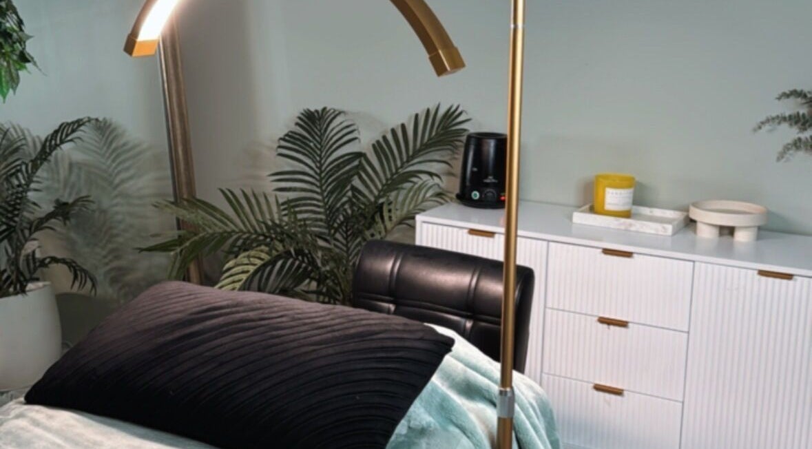 Relaxing treatment room at Beauty Expressed, Oxenford, Queensland, AU. Features elegant decor and spa ambiance.