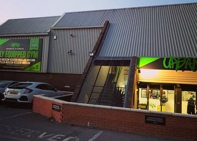 Exterior of Urban Sports Fitness gym at dusk, located in Royal Leamington Spa, England, GB.