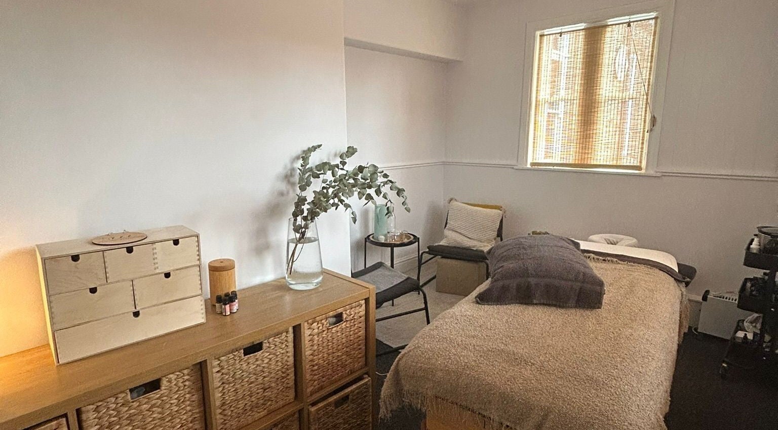 Relaxing therapy room at Love Heald Breathwork and Wellness in Leeds, England, GB, featuring cozy decor.