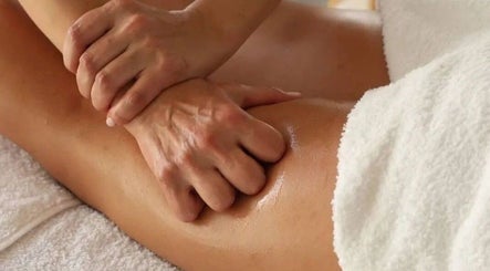 Relaxing massage at Hellen Passinato Massage Therapist in London, GB showcasing skilled hand technique.