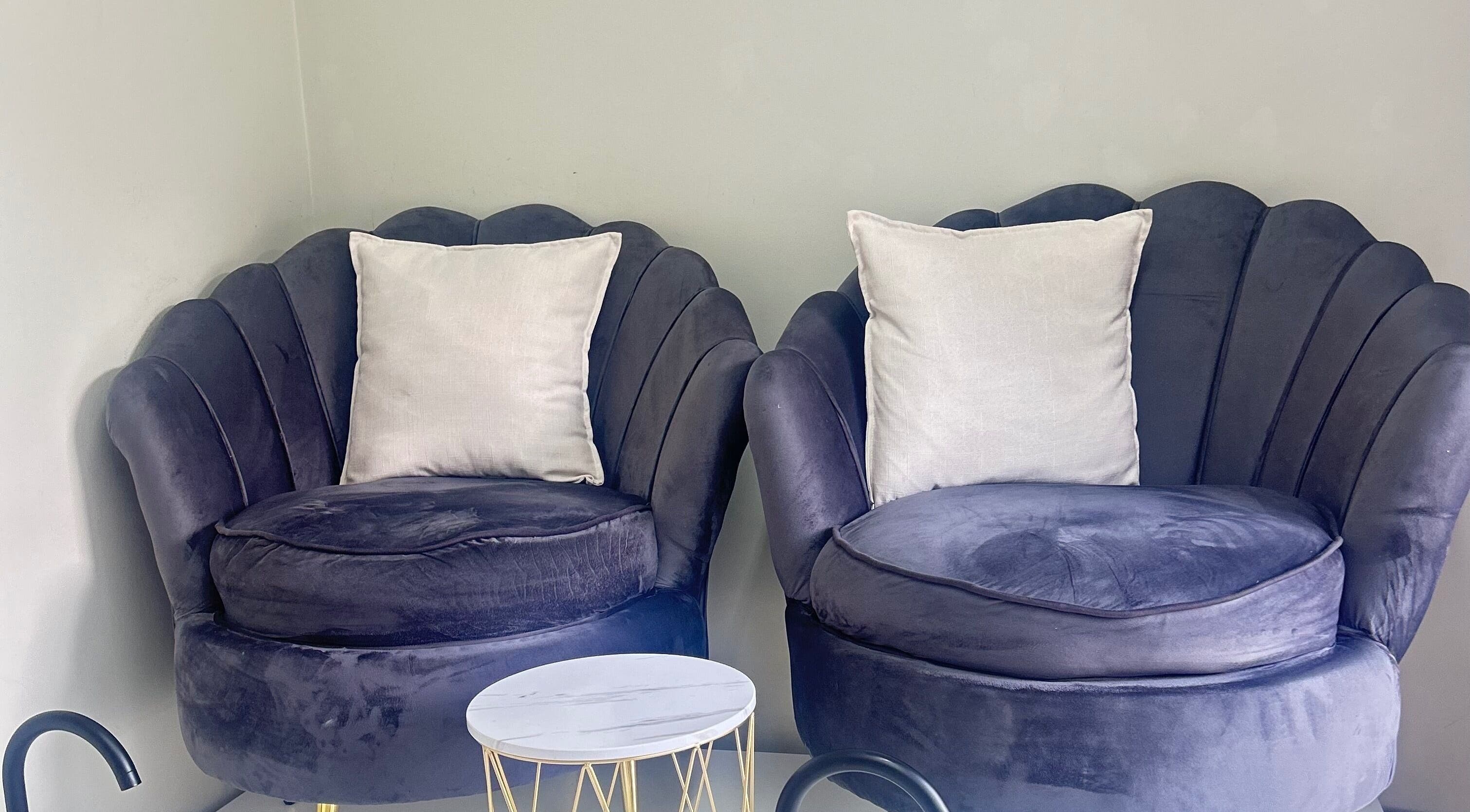 Elegant lounge with plush chairs at Blush Nails, Sandton, Gauteng, ZA.