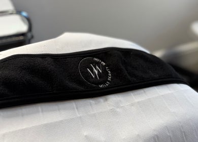 Luxurious treatment table at Mills Beauty in Oxenholme, England, GB, ready for a comforting spa session.