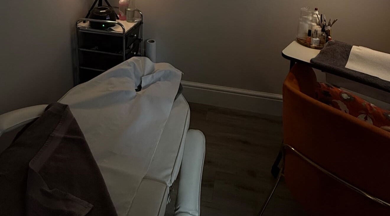 Relaxing treatment room at Mills Beauty, Oxenholme, England, GB with a comfortable spa chair.