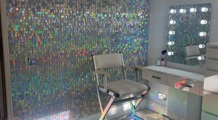 Chic salon chair and illuminated mirror at Paula & Zoe Hairdressing in Banchory, Scotland, GB.