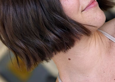 Stylish bob haircut at Color Hub Salon, Cape Town, Western Cape, ZA, showcasing sleek, dark hair.