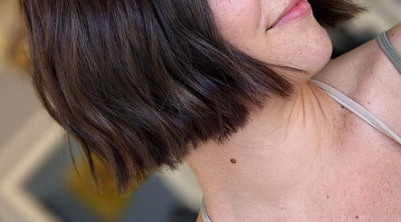 Stylish bob haircut at Color Hub Salon, Cape Town, Western Cape, ZA, showcasing sleek, dark hair.