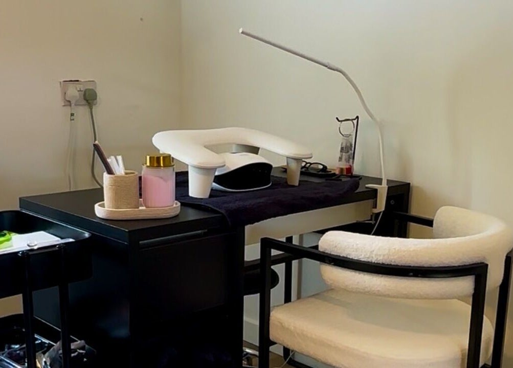 Nails.co manicure station with tools in Beech Hill, England, GB, offering serene and professional nail services.