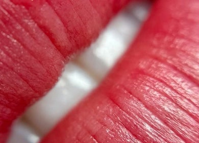 Close-up of vibrant red lips at Beauty Redefined & Aesthetics, Midrand, Gauteng, ZA.