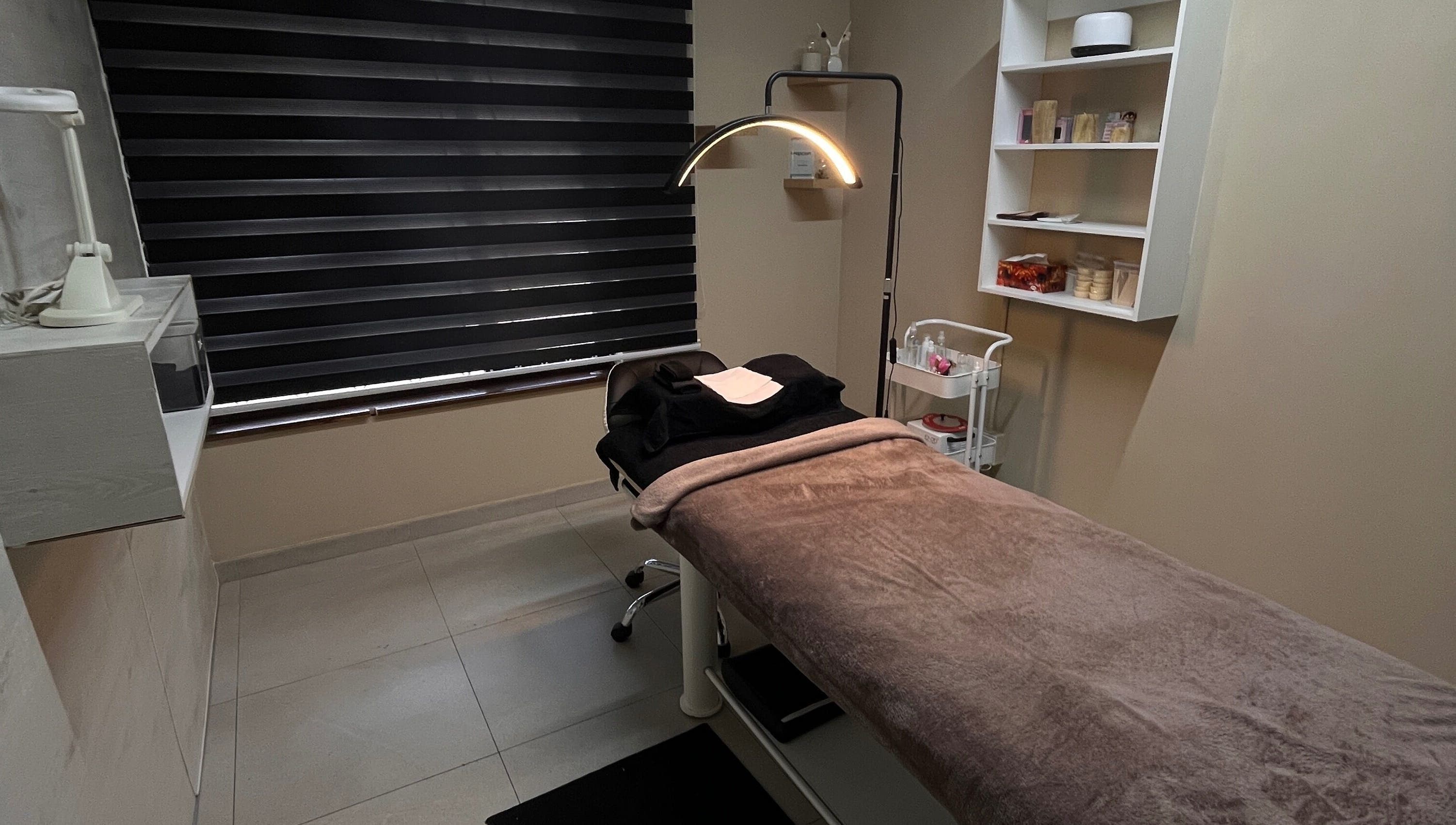 Cozy spa treatment room at Made Seven, Othongathi, Kwazulu-natal, ZA with massage table and soothing decor.