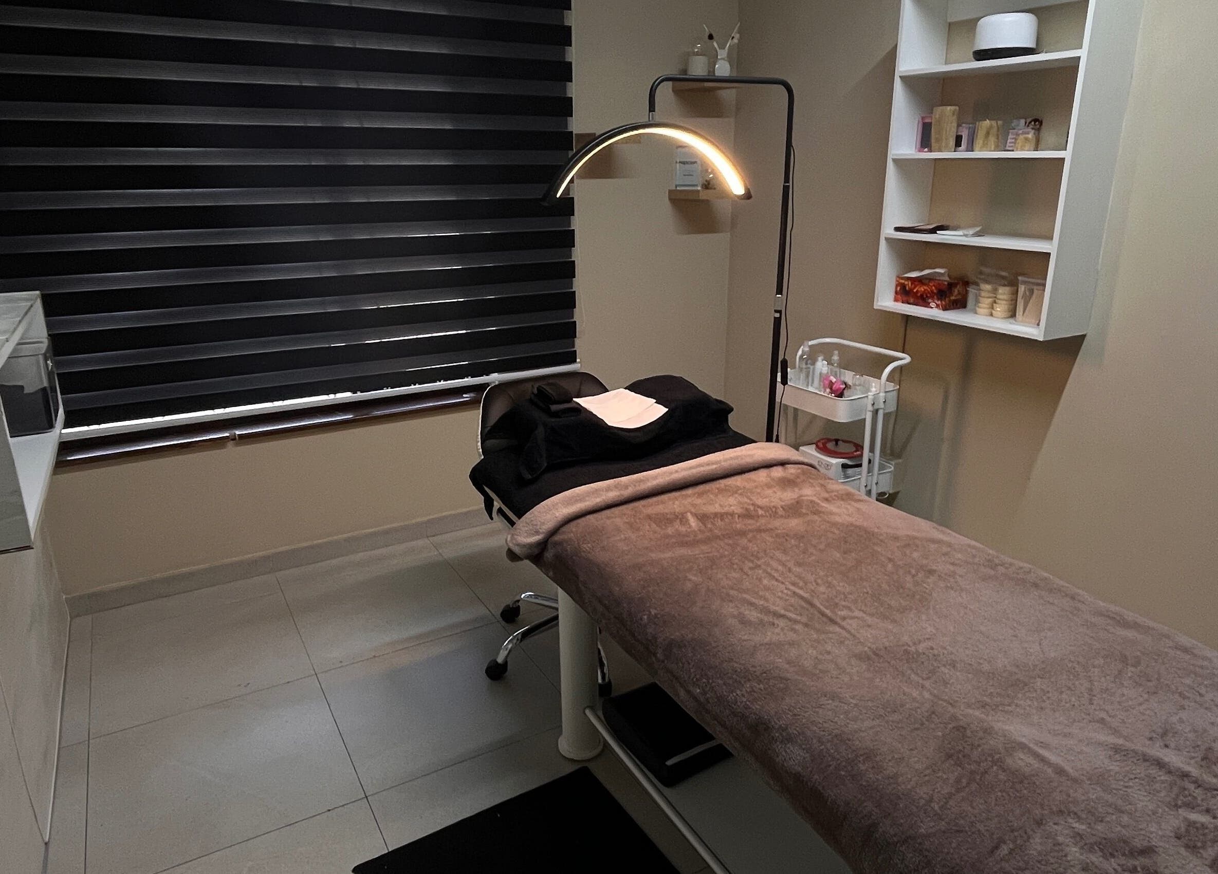 Cozy spa treatment room at Made Seven, Othongathi, Kwazulu-natal, ZA with massage table and soothing decor.