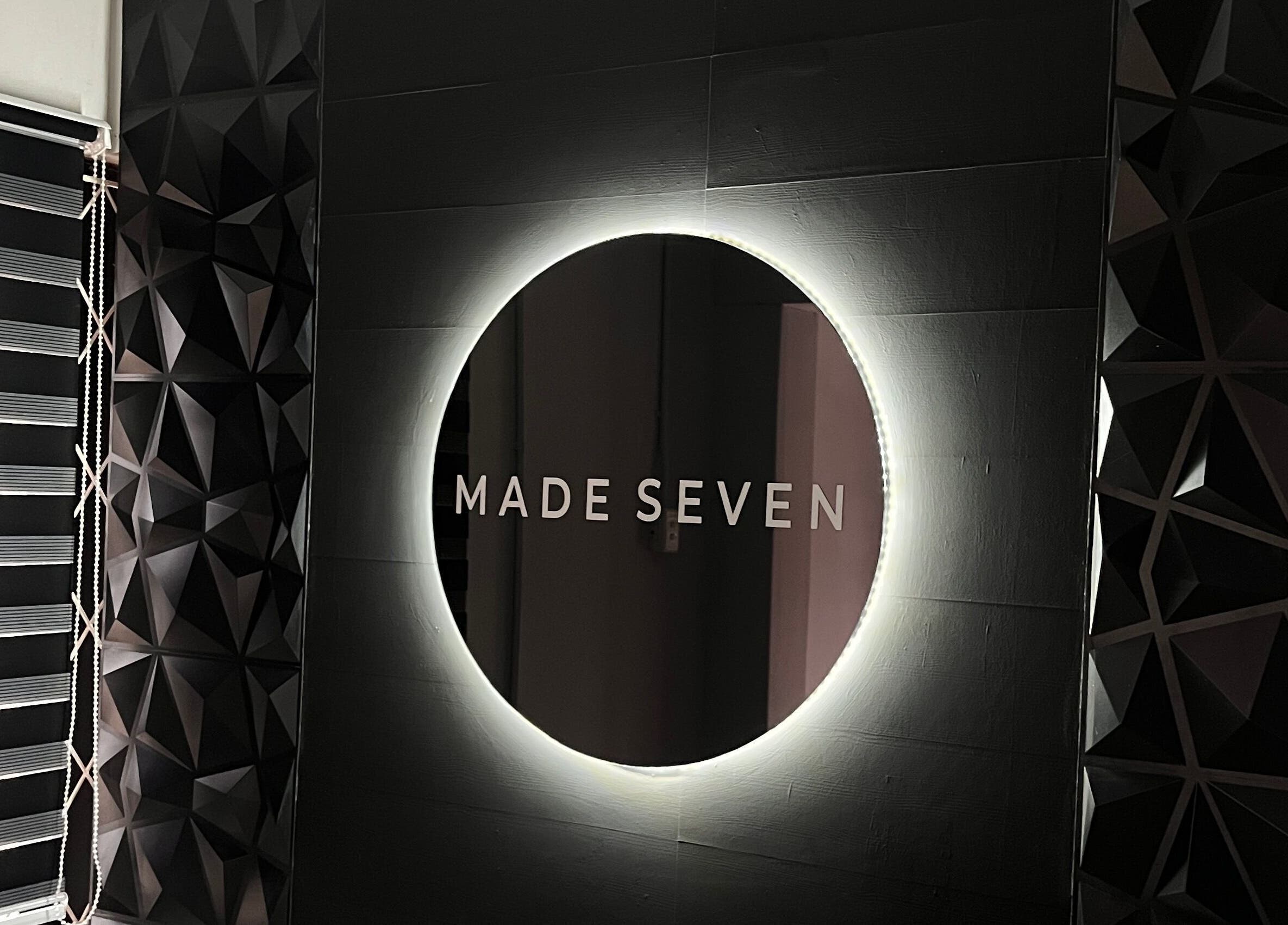 Illuminated circular mirror at Made Seven, Othongathi, Kwazulu-natal, ZA reflecting modern elegance.