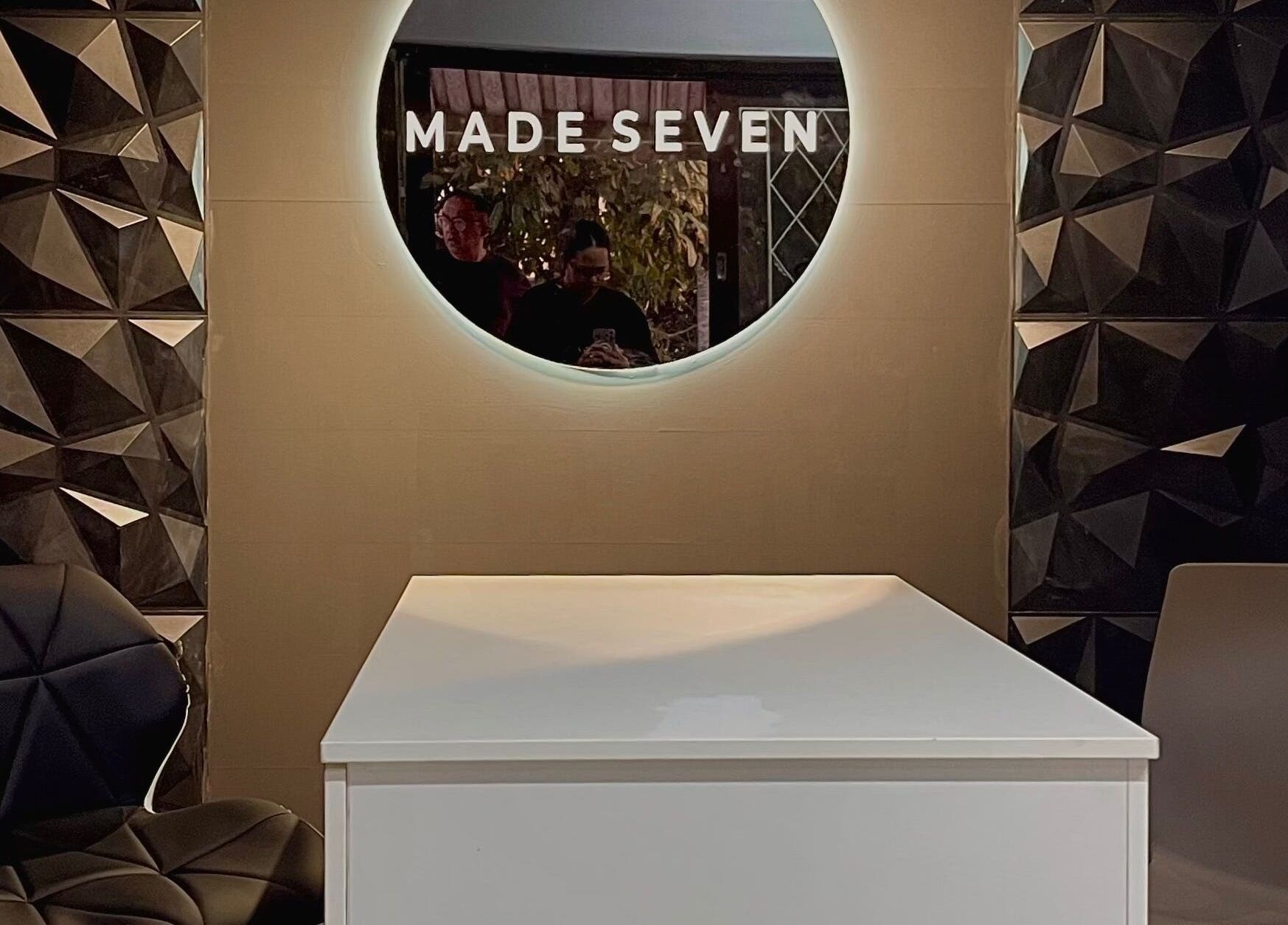 Modern reception area at Made Seven, Othongathi, Kwazulu-natal, ZA with geometric decor and cozy seating.