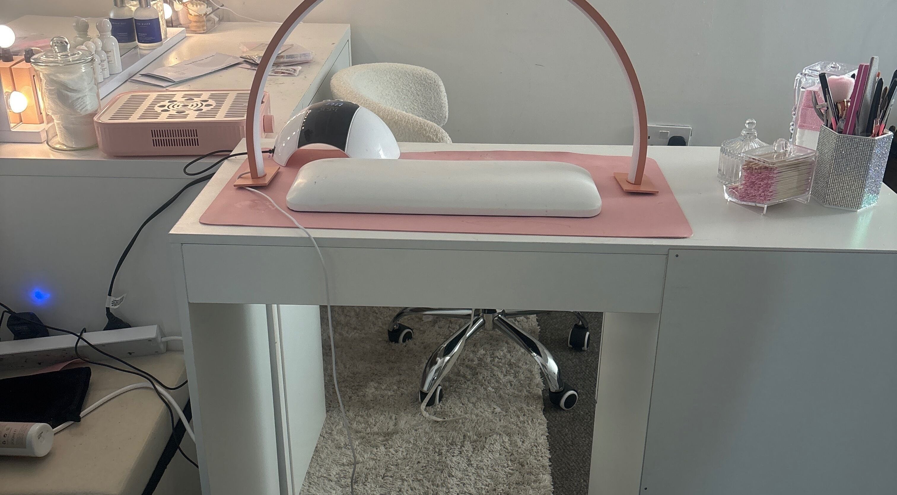 Chic nail station at Nails by ells, Forest Row, England, GB with manicure tools and modern decor.