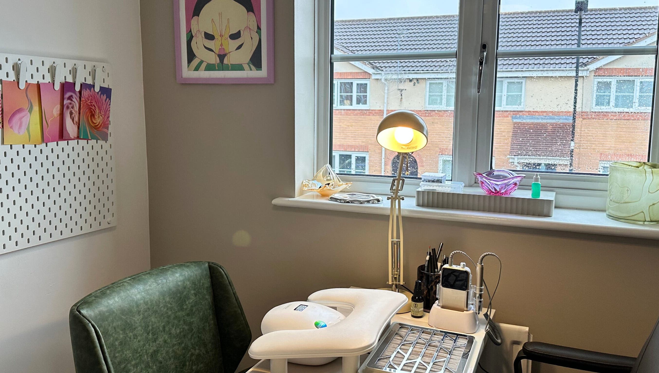 Modern nail station at My Nail Muse, Sheffield, England, GB, featuring vibrant art and cozy ambiance.