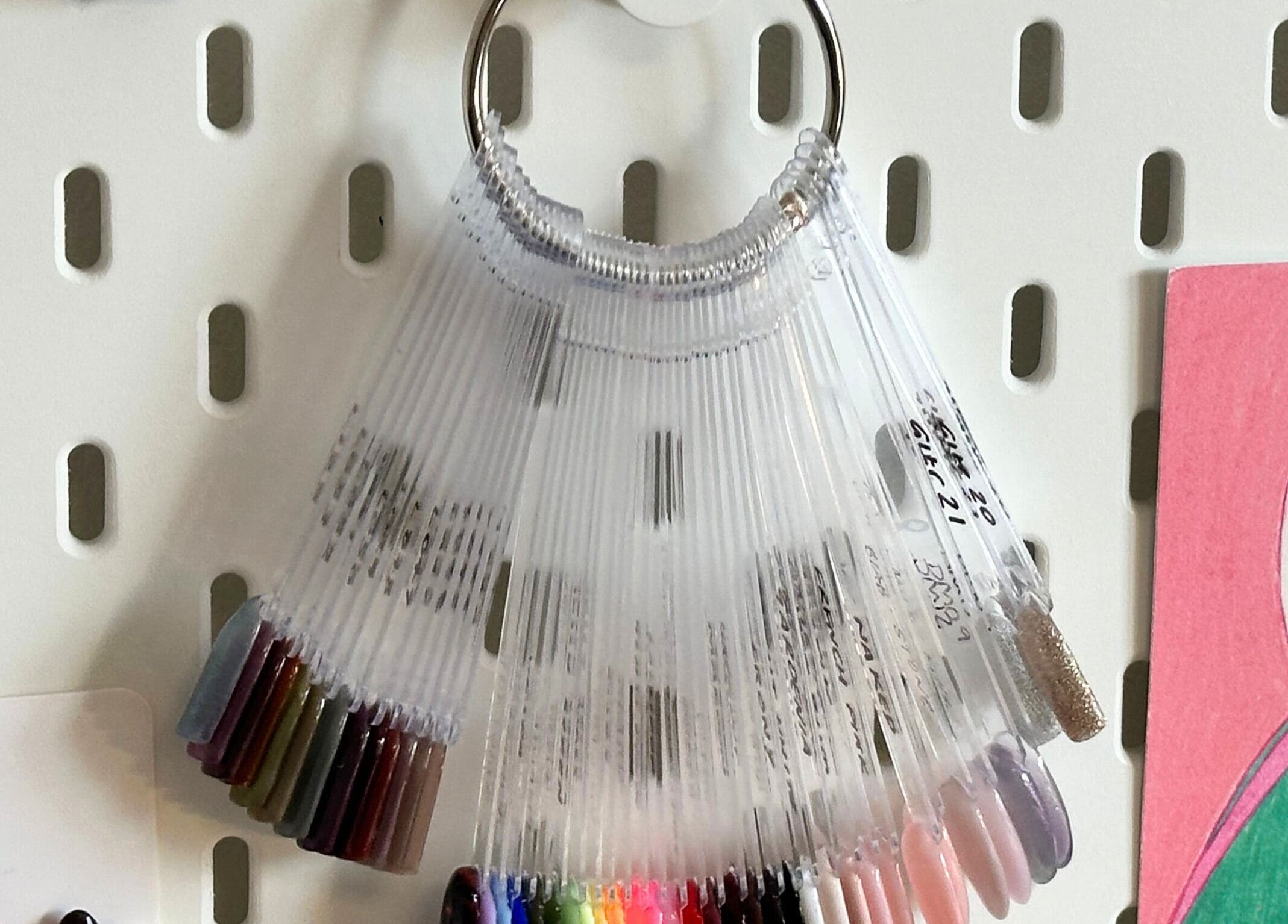 Nail color swatches on white board at My Nail Muse, Sheffield, England, GB.