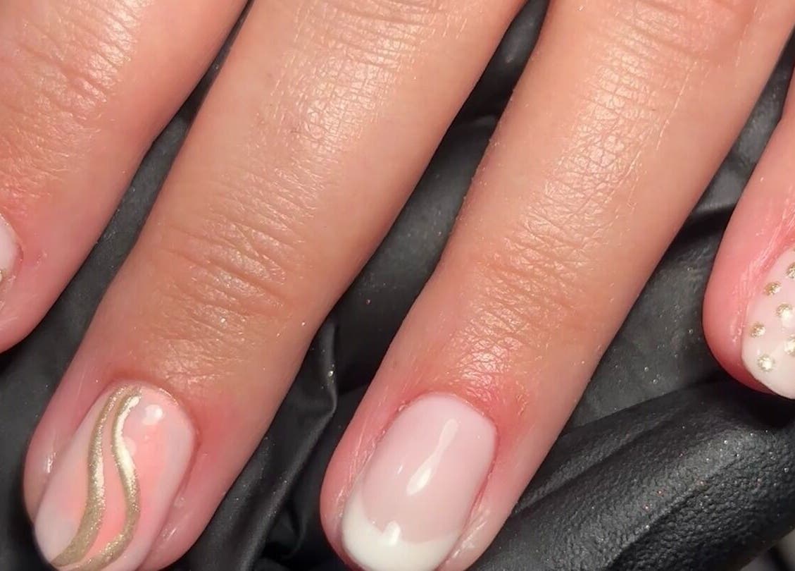 Elegant nail art with gold accents at My Nail Muse, Sheffield, England, GB; perfect for chic styling.