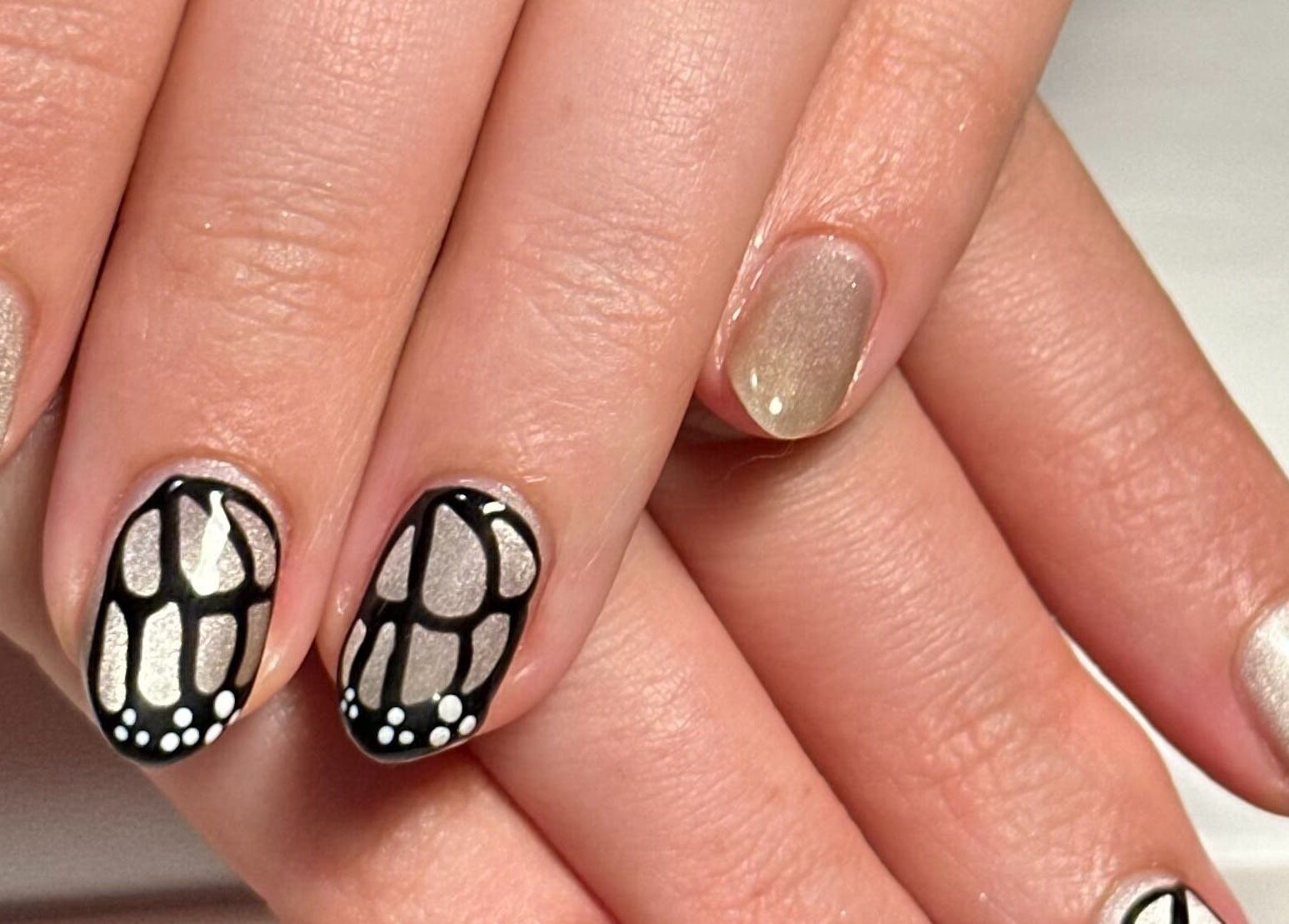 Butterfly-inspired nail design at My Nail Muse in Sheffield, England, GB. Perfect for chic style lovers.