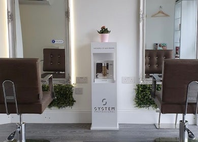 Elegant salon chairs at Curly Life London, a refined beauty venue in London, England, GB.
