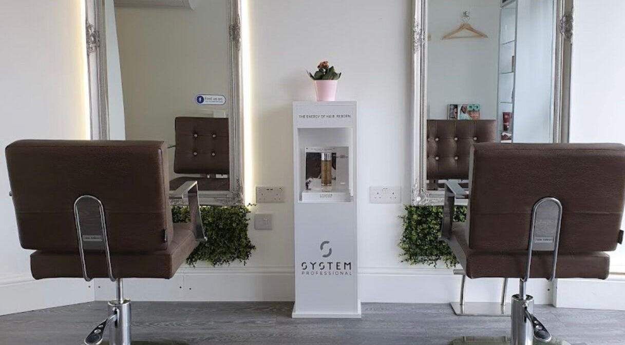 Elegant salon chairs at Curly Life London, a refined beauty venue in London, England, GB.